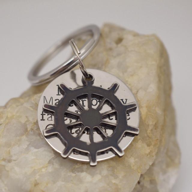 Black rudder sanded stainless steel keychain.jpg